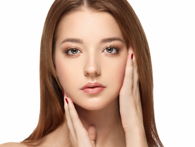 Beautiful woman face close up portrait young with red hair